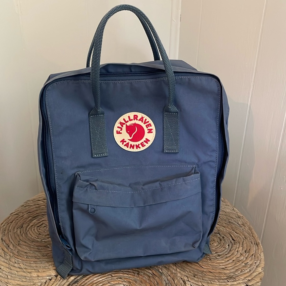 Fjallraven Kanken backpack- navy has been used but easy to clean